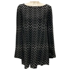 ALAIA BLACK / WHITE FLARED LONG SLEEVED STRETCH KNIT TOP